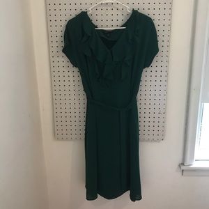 Emerald green ruffle front dress